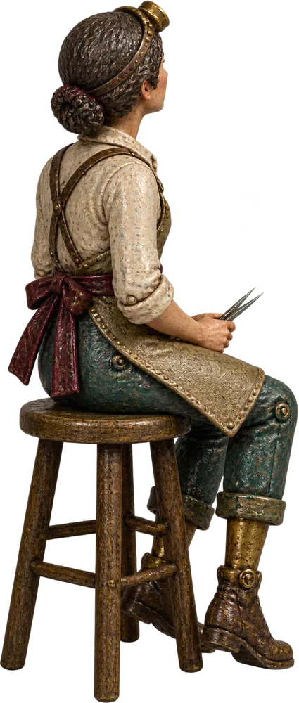 Wren seen from behind, sitting on a stool with her tweezers lowered, looking at the empty bar